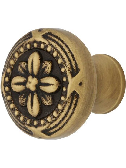 1 1/4 inch Ribbon and Reed Cabinet Knob in Antique Brass.